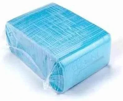 Pack of blue dental patient bibs by Beetle Dental with textured surface for splash protection