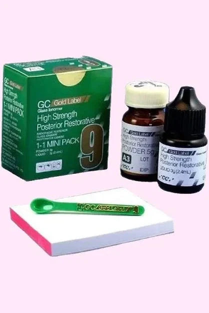 GC 9 Gold Label dental cement in a mini pack with powder, liquid, and application spoon