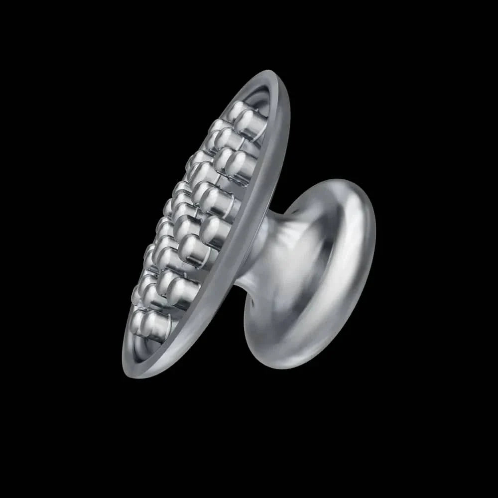 Close-up of orthodontic metal bonding buttons designed for secure braces attachment in dental treatments