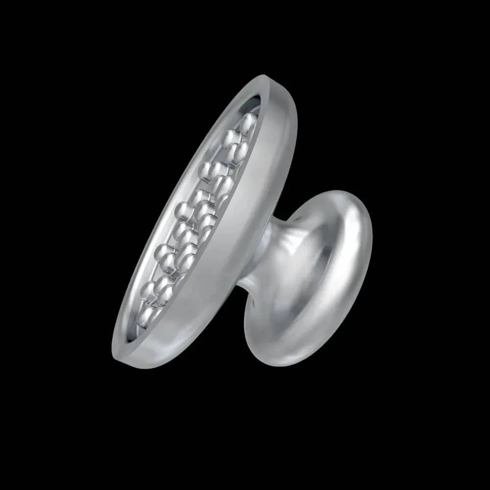 Orthodontic metal bonding buttons from Beetle Dental designed for secure attachment in orthodontic treatments