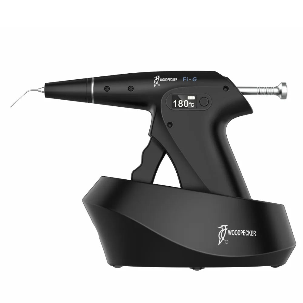 Woodpecker obturation gun in black with ergonomic pistol grip and charging base for dental root filling